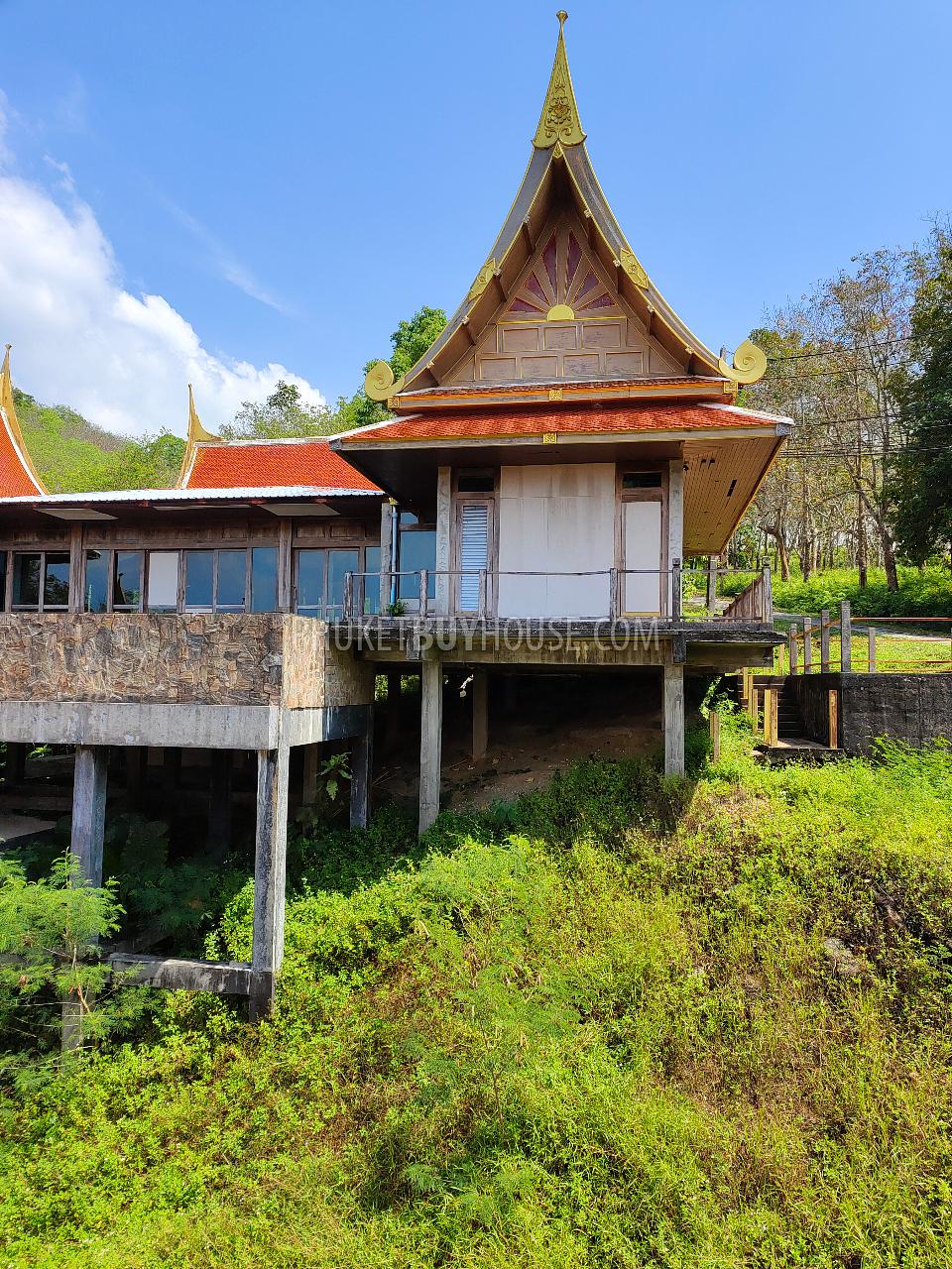 MAI7181: 6 rai of land with 4 Thai Style Houses in Mai Khao. Photo #16
