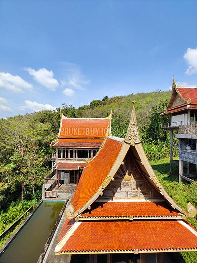 MAI7181: 6 rai of land with 4 Thai Style Houses in Mai Khao. Photo #10