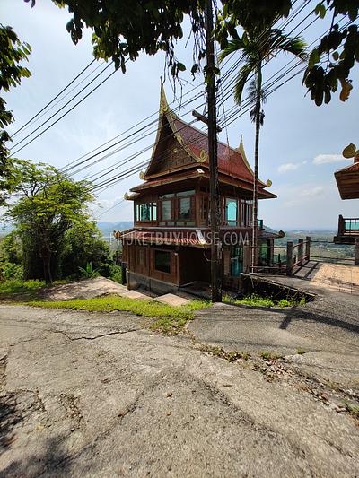 MAI7181: 6 rai of land with 4 Thai Style Houses in Mai Khao. Photo #29