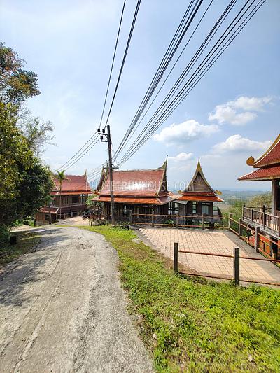 MAI7181: 6 rai of land with 4 Thai Style Houses in Mai Khao. Photo #35