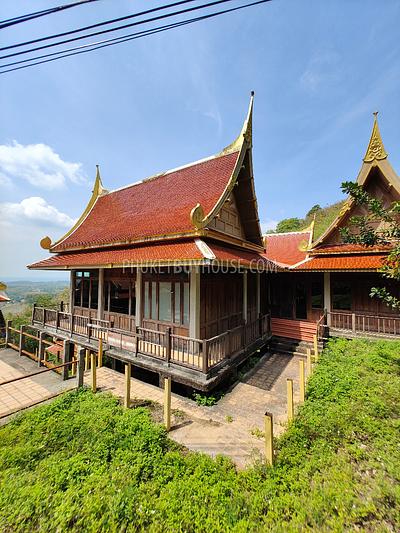 MAI7181: 6 rai of land with 4 Thai Style Houses in Mai Khao. Photo #37
