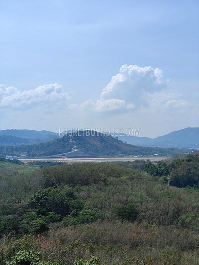 MAI7181: 6 rai of land with 4 Thai Style Houses in Mai Khao. Photo #8