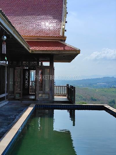 MAI7181: 6 rai of land with 4 Thai Style Houses in Mai Khao. Photo #9
