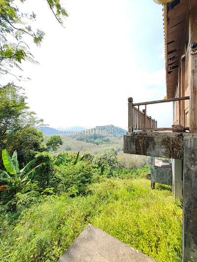 MAI7181: 6 rai of land with 4 Thai Style Houses in Mai Khao. Photo #11