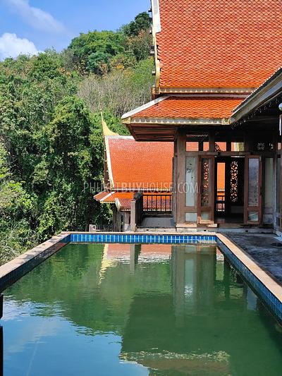 MAI7181: 6 rai of land with 4 Thai Style Houses in Mai Khao. Photo #2
