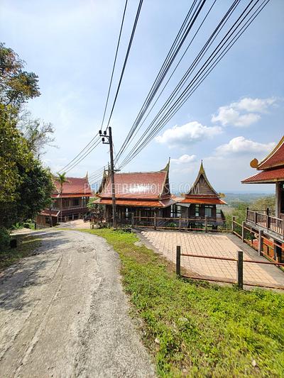 MAI7181: 6 rai of land with 4 Thai Style Houses in Mai Khao. Photo #16