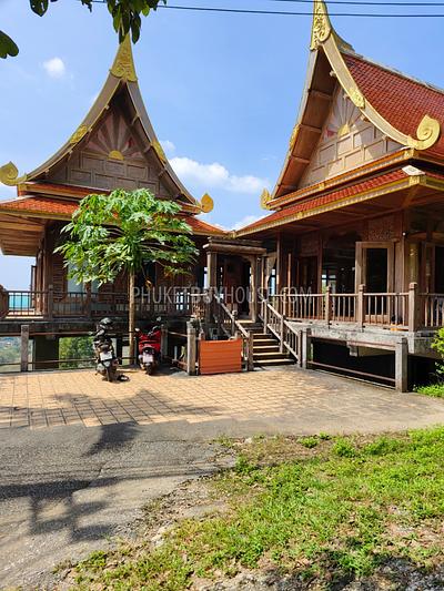 MAI7181: 6 rai of land with 4 Thai Style Houses in Mai Khao. Photo #4