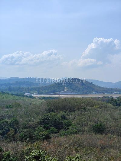 MAI7181: 6 rai of land with 4 Thai Style Houses in Mai Khao. Photo #12