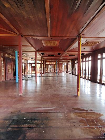 MAI7181: 6 rai of land with 4 Thai Style Houses in Mai Khao. Photo #13