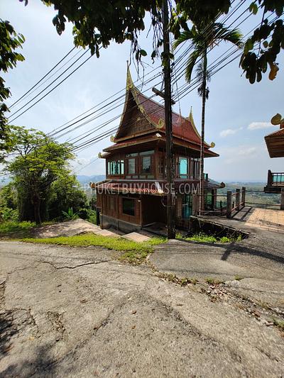 MAI7181: 6 rai of land with 4 Thai Style Houses in Mai Khao. Photo #21