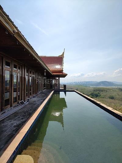 MAI7181: 6 rai of land with 4 Thai Style Houses in Mai Khao. Photo #10