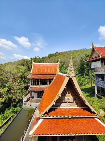 MAI7181: 6 rai of land with 4 Thai Style Houses in Mai Khao. Photo #17