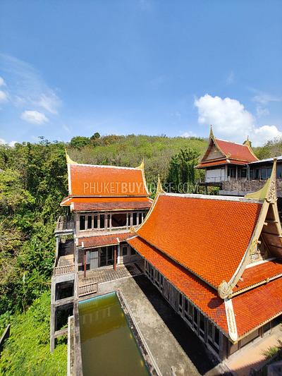 MAI7181: 6 rai of land with 4 Thai Style Houses in Mai Khao. Photo #1