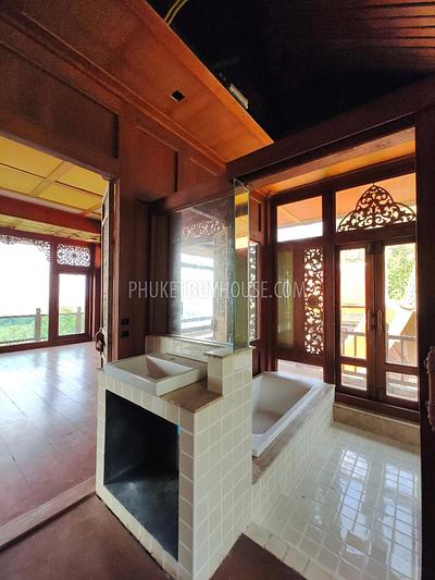 MAI7181: 6 rai of land with 4 Thai Style Houses in Mai Khao. Photo #18
