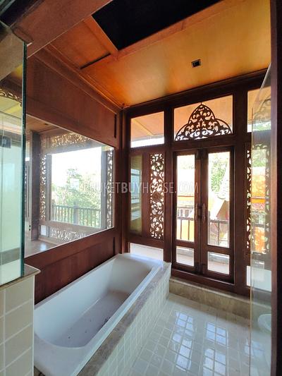 MAI7181: 6 rai of land with 4 Thai Style Houses in Mai Khao. Photo #15