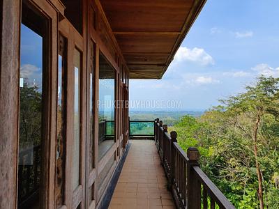MAI7181: 6 rai of land with 4 Thai Style Houses in Mai Khao. Photo #23