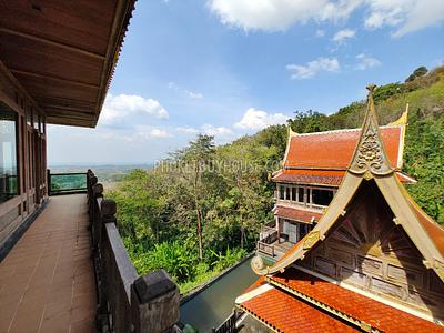 MAI7181: 6 rai of land with 4 Thai Style Houses in Mai Khao. Photo #26