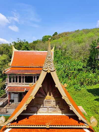 MAI7181: 6 rai of land with 4 Thai Style Houses in Mai Khao. Photo #32