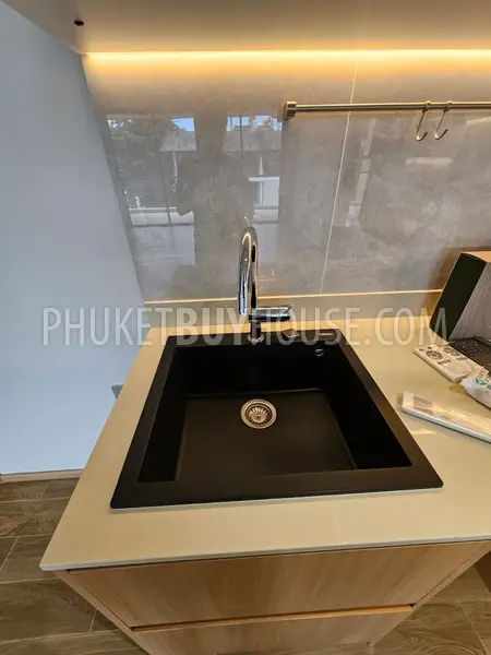 BAN22680: Modern 2-Bedroom Apartment Near Bang Tao Beach with Rooftop Facilities. Photo #40